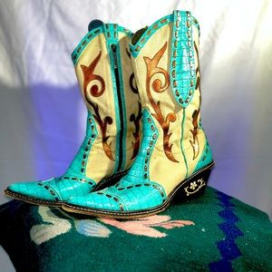 These are basically one of a kind Donald J Pliner Cowgirl Boots.
